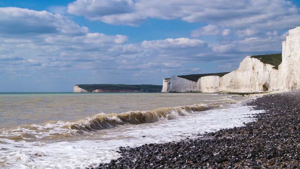 waves and white chalk cliffs at one of the popular London beaches