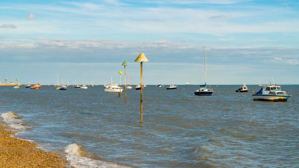 water boats sailing in southend-on sea beach