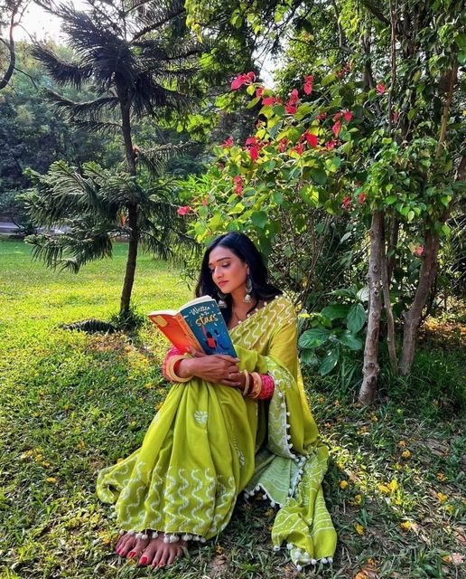 Aishwarya Khare reading a book
