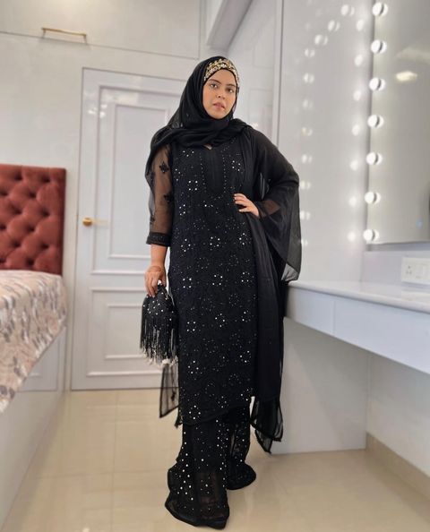 Saba Ibrahim in black outfit