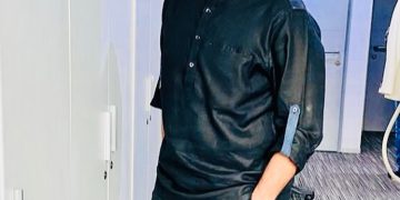 Sudhir Chaudhury in black attire - husban dof Niti Chaudhury