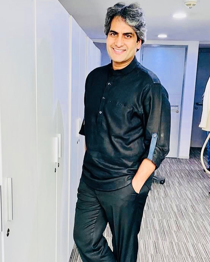 Sudhir Chaudhury in black attire - husban dof Niti Chaudhury